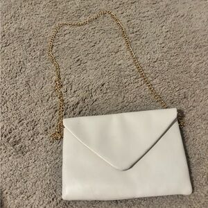 Elegant White Clutch with Gold Chain